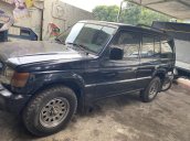 Mitsubishi Pajero xe năm 2003 màu xanh ghi