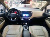 Bán ô tô Kia Rio đời 2015, màu trắng, xe nhập