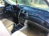 Bán Ford Laser năm 2003, màu vàng còn mới