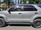 Bán gấp Fortuner xăng đăng ký T7/2015 mới 98%