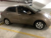 Bán nhanh chiếc Hyundai i10 sx 2017 màu vàng cát, đi 10.500km