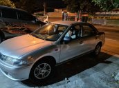 Bán Mazda 323 đời 1999, màu xám giá cạnh tranh