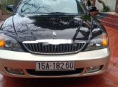 Cần bán lại xe Daewoo Magnus đời 2004, màu đen, 125tr