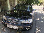 Cần bán xe Ford Laser đời 2004, màu đen, nhập khẩu còn mới, 185tr