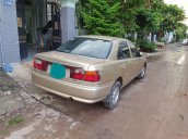 Cần bán lại xe Mazda 323 đời 1999, màu vàng