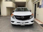 Cần bán xe Mazda BT 50 sản xuất năm 2014, màu trắng, nhập khẩu nguyên chiếc còn mới