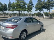 Cần bán xe Toyota Corolla Altis đăng ký 2015, màu Bạc mới 95% giá chỉ 490 triệu đồng