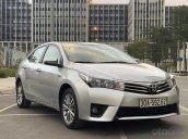 Cần bán Toyota Corolla Altis 1.8G AT sản xuất 2015, màu bạc, 585 triệu