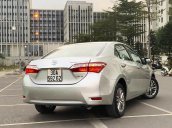 Cần bán Toyota Corolla Altis 1.8G AT sản xuất 2015, màu bạc, 585 triệu