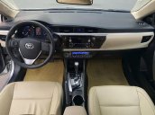 Cần bán Toyota Corolla Altis 1.8G AT sản xuất 2015, màu bạc, 585 triệu