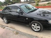 Cần bán gấp Mazda 626 đời 2001, màu đen chính chủ