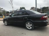 Cần bán gấp Mazda 626 đời 2001, màu đen chính chủ