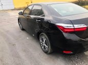 Cần bán gấp Toyota Corolla Altis 1.8E AT năm sản xuất 2018, màu đen còn mới