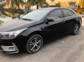 Cần bán gấp Toyota Corolla Altis 1.8E AT năm sản xuất 2018, màu đen còn mới