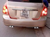 Cần bán xe Daewoo Lacetti năm sản xuất 2004, màu vàng