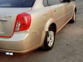 Cần bán xe Daewoo Lacetti năm sản xuất 2004, màu vàng