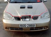 Cần bán xe Daewoo Lacetti năm sản xuất 2004, màu vàng