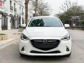 Bán gấp giá đẹp xe Mazda 2 1.5AT sản xuất 2016, màu trắng, biển Sài Gòn