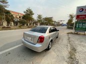 Cần bán lại xe Daewoo Lacetti EX năm 2010, màu bạc, giá bằng con xe máy