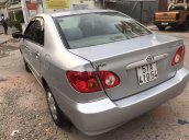 Cần bán Toyota Corolla đời 2002, màu bạc 