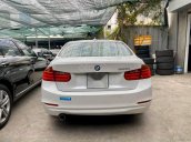 Cần bán xe BMW 320i 2013, màu trắng