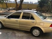 Xe Ford Laser sản xuất năm 2002, màu vàng, giá 130tr