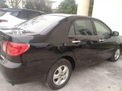 Cần bán gấp Toyota Corolla Altis đời 2003, màu đen 