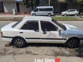 Cần bán lại xe Mazda 323 sản xuất 1994, màu trắng, nhập khẩu nguyên chiếc