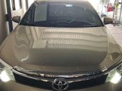 Bán Toyota Camry sản xuất 2015, màu ghi vàng, xe chính chủ, giá ưu đãi