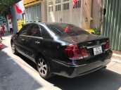 Cần bán gấp Toyota Camry đời 2004, màu đen, xe nhập, giá tốt