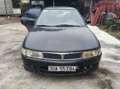 Cần bán gấp Mitsubishi Lancer đời 2001, màu đen 