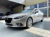 Bán xe Mazda 3 AT 2.0 2015, màu vàng