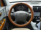 Cần bán gấp Hyundai Tucson sản xuất năm 2009, màu vàng, xe nhập còn mới