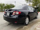 Cần bán lại xe Toyota Corolla Altis sản xuất năm 2014, màu đen còn mới