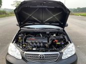 Cần bán gấp Toyota Corolla Altis đời 2004, màu đen