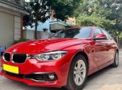 Nhà tôi cần bán BMW 320i Model 2017 nhập Đức, số tự động, màu đỏ tươi