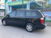 Bán Kia Carnival đời 2009, màu đen, xe nhập còn mới, giá 295tr