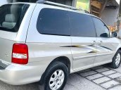 Cần bán gấp Kia Carnival năm sản xuất 2009, màu vàng, nhập khẩu nguyên chiếc còn mới, 270tr