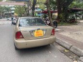 Bán Ford Laser năm sản xuất 2002, màu vàng, nhập khẩu 