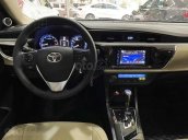 Cần bán gấp Toyota Corolla 1.8G sản xuất năm 2016, màu đen còn mới, 630tr