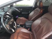 Xe Hyundai Tucson 2.0 AT đời 2012, màu trắng còn mới, giá tốt