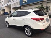 Xe Hyundai Tucson 2.0 AT đời 2012, màu trắng còn mới, giá tốt