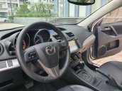 Cần bán Mazda 3 năm sản xuất 2014, màu trắng