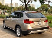 Bán xe BMW X1 2010, màu vàng cát