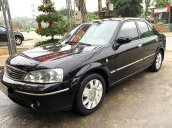 Cần bán Ford Laser năm 2004, màu đen, giá tốt