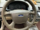 Cần bán Ford Laser năm 2004, màu đen, giá tốt