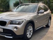 Bán xe BMW X1 2010, màu vàng cát