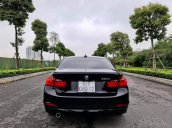 Cần bán lại xe BMW 3-Series 320i đời 2014, màu đen
