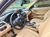 Cần bán lại xe BMW 3-Series 320i đời 2014, màu đen