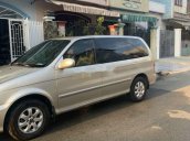 Xe Kia Carnival đời 2008, màu vàng, nhập khẩu 